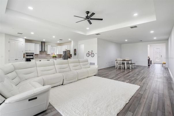 Dining room, Interior, Kitchen, Living room, Recessed Lighting, Stainless Steel Appliances, Wood Texture Flooring
