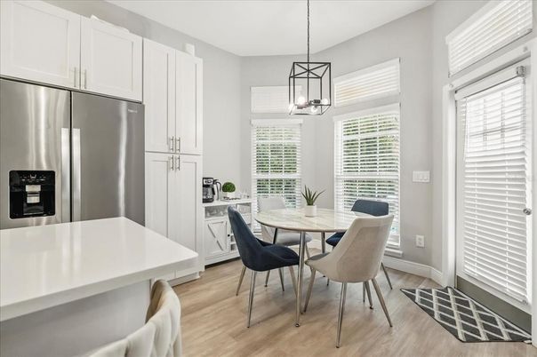 Dining room, Interior, Kitchen, Pendant Lights, Stainless Steel Appliances, Wood Texture Flooring