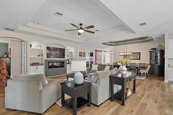 Dining room, Fireplace, Interior, Living room, Pendant Lights, Wood Texture Flooring