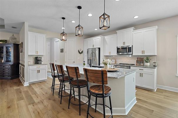 Interior, Kitchen, Pendant Lights, Recessed Lighting, Stainless Steel Appliances, Wood Texture Flooring