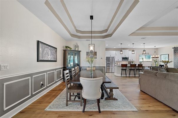 Dining room, Interior, Kitchen, Living room, Pendant Lights, Recessed Lighting, Stainless Steel Appliances, Wood Texture Flooring