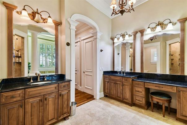 Bathroom, Chandelier, Dual Sink Vanities, Interior, Wood Texture Flooring