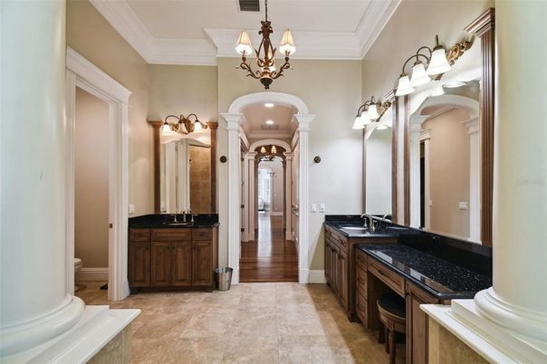 Bathroom, Chandelier, Dual Sink Vanities, Interior, Recessed Lighting, Wood Texture Flooring