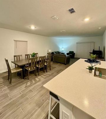 Dining room, Interior, Living room, Recessed Lighting, Wood Texture Flooring