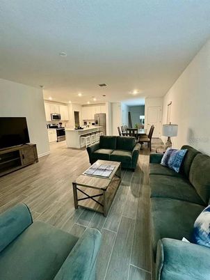 Dining room, Interior, Kitchen, Living room, Pendant Lights, Recessed Lighting, Stainless Steel Appliances, Wood Texture Flooring