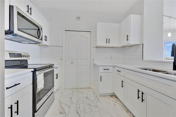 Interior, Kitchen, Marble, Pendant Lights, Stainless Steel Appliances