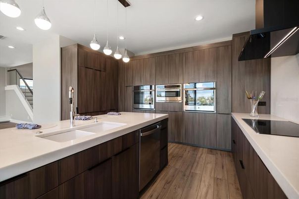 Interior, Kitchen, Pendant Lights, Recessed Lighting, Stainless Steel Appliances, Wood Texture Flooring