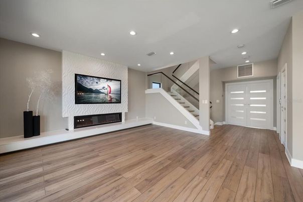Fireplace, Interior, Recessed Lighting, Wood Texture Flooring