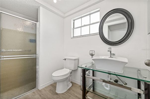 Bathroom, Glass Shower, Interior, Recessed Lighting, Wood Texture Flooring