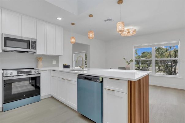Interior, Kitchen, Pendant Lights, Recessed Lighting, Stainless Steel Appliances, Wood Texture Flooring