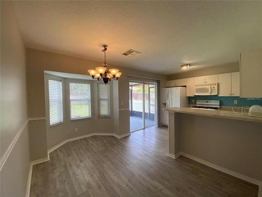 Chandelier, Interior, Kitchen, Stainless Steel Appliances, Wood Texture Flooring