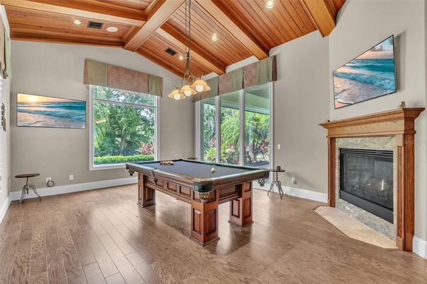 Billiard Table, Fireplace, Game Room, Interior, Pendant Lights, Recessed Lighting, Wooden Beams, Wooden Ceilings, Wood Texture Flooring