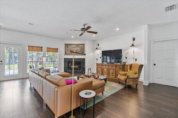 Fireplace, Interior, Living room, Recessed Lighting, Wood Texture Flooring