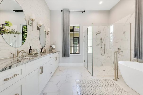 Bathroom, Dual Sink Vanities, Free Standing Baths, Glass Shower, Interior, Marble, Marble Walls, Recessed Lighting