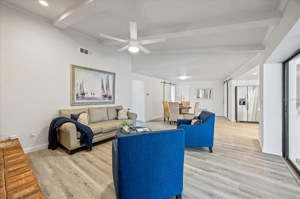Dining room, Interior, Kitchen, Living room, Recessed Lighting, Stainless Steel Appliances, Wood Texture Flooring