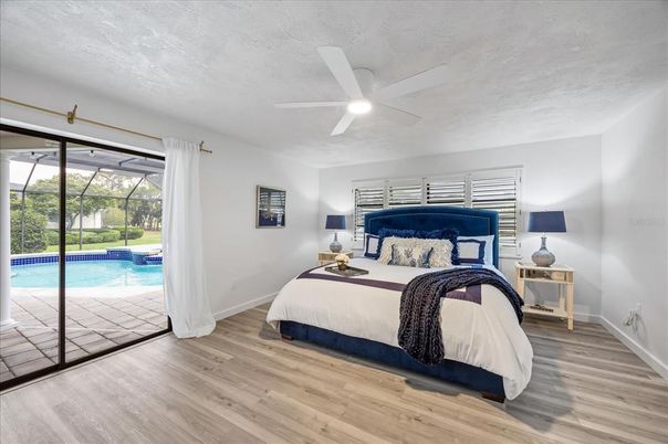 Bedroom, Interior, Pool, Sun Room, Wood Texture Flooring