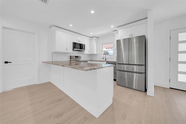 Interior, Kitchen, Recessed Lighting, Stainless Steel Appliances, Wood Texture Flooring