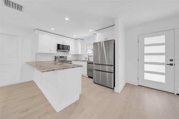 Interior, Kitchen, Recessed Lighting, Stainless Steel Appliances, Wood Texture Flooring