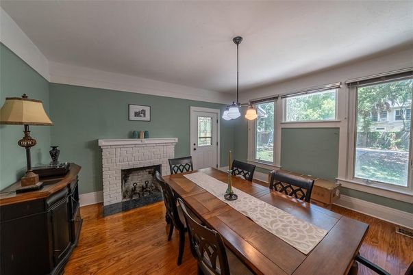Dining room, Fireplace, Interior, Pendant Lights, Wood Texture Flooring