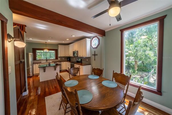 Dining room, Interior, Kitchen, Pendant Lights, Recessed Lighting, Stainless Steel Appliances, Wood Texture Flooring