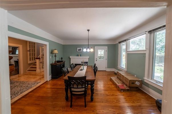 Dining room, Fireplace, Interior, Pendant Lights, Wood Texture Flooring