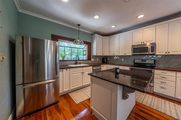Interior, Kitchen, Pendant Lights, Recessed Lighting, Stainless Steel Appliances, Wood Texture Flooring