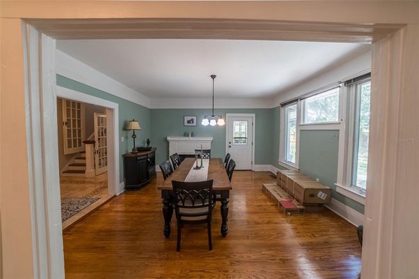 Dining room, Fireplace, Interior, Pendant Lights, Wood Texture Flooring