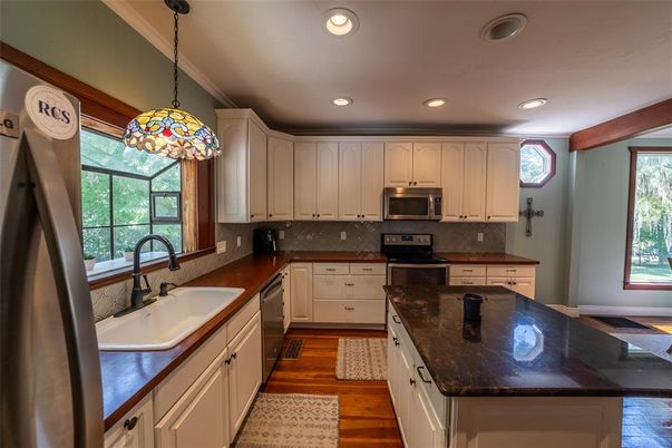 Interior, Kitchen, Pendant Lights, Recessed Lighting, Stainless Steel Appliances, Wood Texture Flooring
