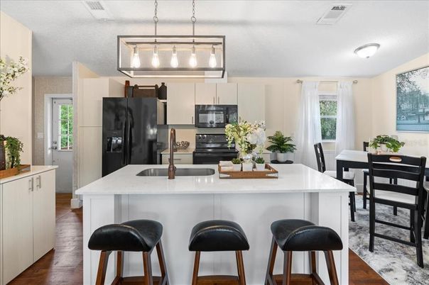 Dining room, Interior, Kitchen, Pendant Lights, Stainless Steel Appliances, Wood Texture Flooring