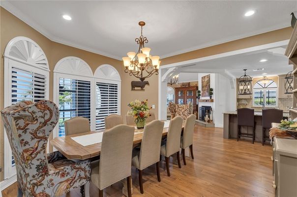 Chandelier, Dining room, Fireplace, Interior, Recessed Lighting, Wood Texture Flooring