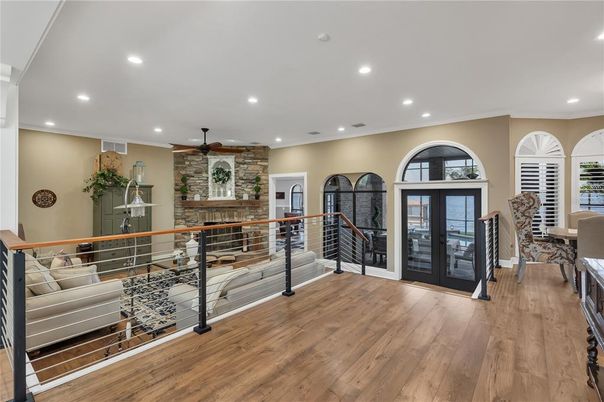 Fireplace, Interior, Recessed Lighting, Stone Walls, Wood Texture Flooring
