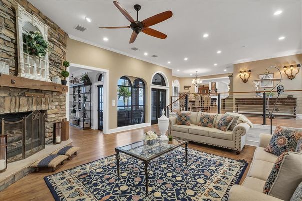 Chandelier, Dining room, Fireplace, Interior, Living room, Recessed Lighting, Wood Texture Flooring