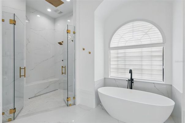 Bathroom, Free Standing Baths, Glass Shower, Interior, Marble, Marble Walls, Recessed Lighting