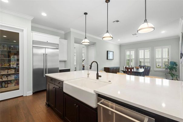 Dining room, Interior, Kitchen, Pendant Lights, Recessed Lighting, Stainless Steel Appliances, Wood Texture Flooring