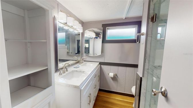 Bathroom, Dual Sink Vanities, Glass Shower, Interior, Wood Texture Flooring