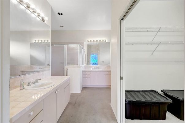 Bathroom, Dual Sink Vanities, Glass Shower, Interior, Recessed Lighting, Tile Countertops