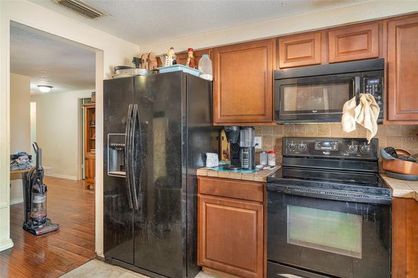 Interior, Kitchen, Tile Countertops, Wood Texture Flooring