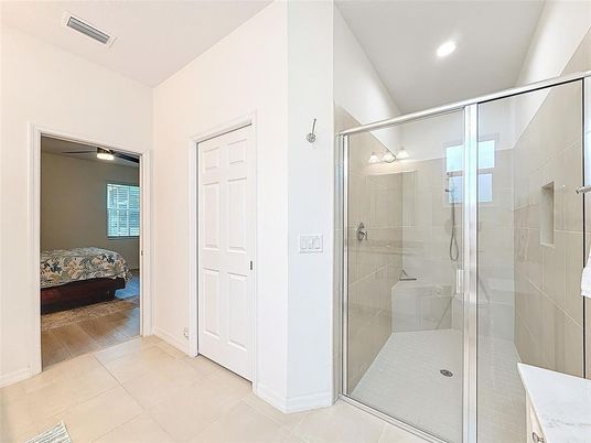 Bathroom, Bedroom, Glass Shower, Interior, Recessed Lighting, Wood Texture Flooring