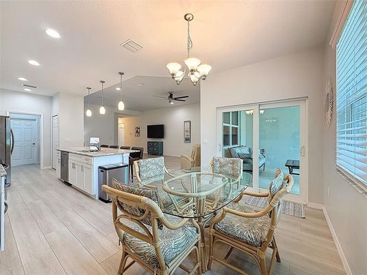 Chandelier, Dining room, Interior, Kitchen, Pendant Lights, Recessed Lighting, Wood Texture Flooring