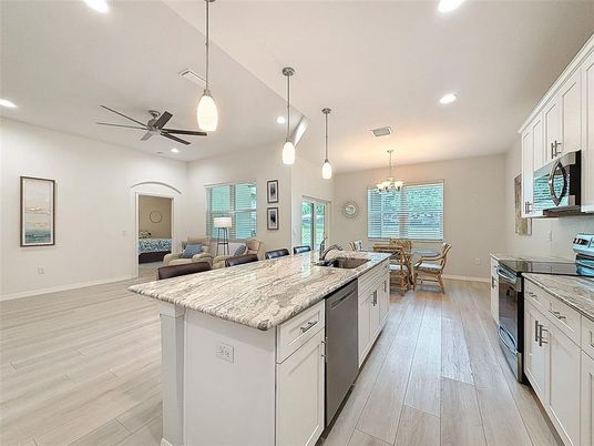 Chandelier, Dining room, Interior, Kitchen, Living room, Pendant Lights, Recessed Lighting, Wood Texture Flooring