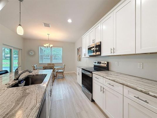 Chandelier, Dining room, Interior, Kitchen, Pendant Lights, Recessed Lighting, Wood Texture Flooring