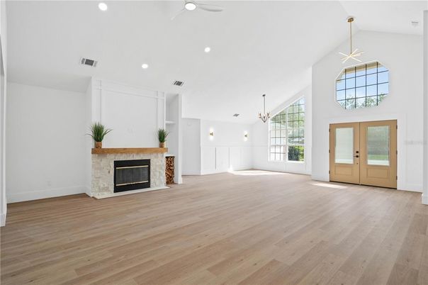 Empty room, Fireplace, Interior, Pendant Lights, Recessed Lighting, Wood Texture Flooring