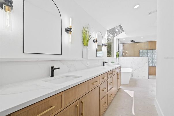 Bathroom, Dual Sink Vanities, Free Standing Baths, Interior, Marble, Marble Walls, Recessed Lighting