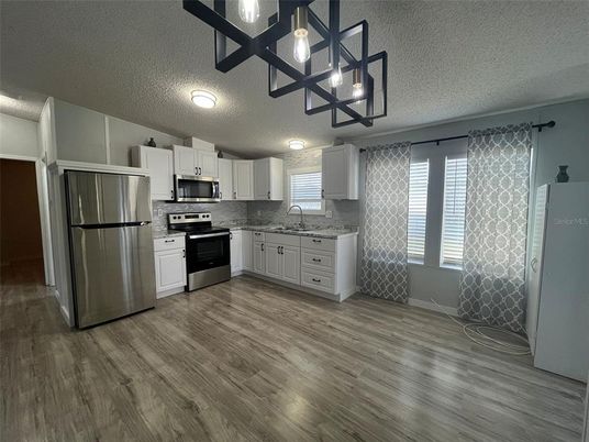 Interior, Kitchen, Pendant Lights, Stainless Steel Appliances, Wood Texture Flooring
