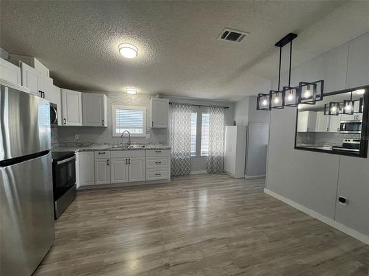 Interior, Kitchen, Pendant Lights, Stainless Steel Appliances, Wood Texture Flooring