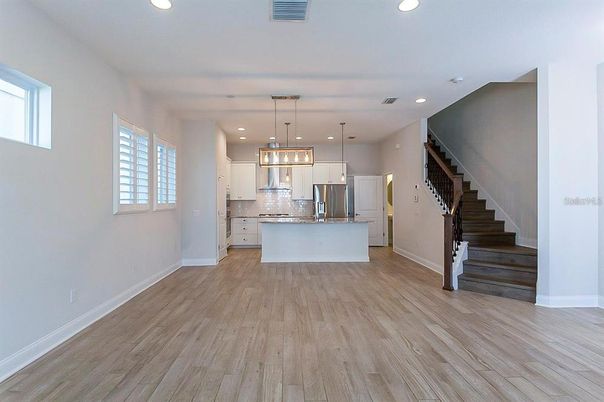 Interior, Kitchen, Pendant Lights, Recessed Lighting, Stainless Steel Appliances, Wood Texture Flooring