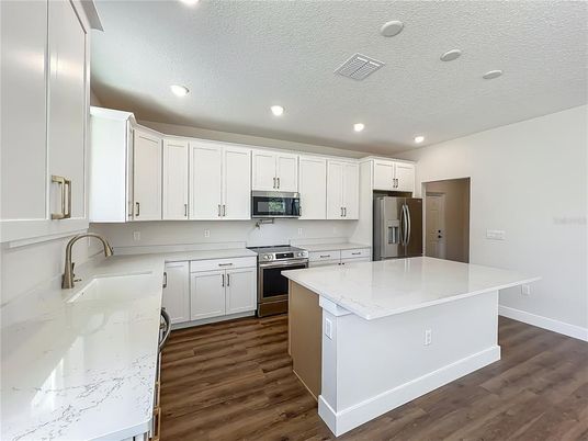Interior, Kitchen, Recessed Lighting, Stainless Steel Appliances, Wood Texture Flooring