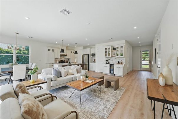 Dining room, Interior, Kitchen, Living room, Pendant Lights, Recessed Lighting, Stainless Steel Appliances, Wood Texture Flooring