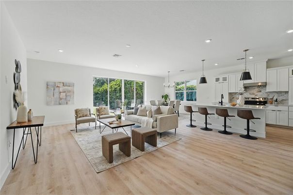Dining room, Interior, Kitchen, Living room, Pendant Lights, Recessed Lighting, Stainless Steel Appliances, Wood Texture Flooring