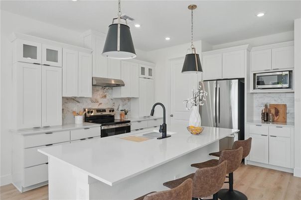 Interior, Kitchen, Pendant Lights, Recessed Lighting, Stainless Steel Appliances, Wood Texture Flooring